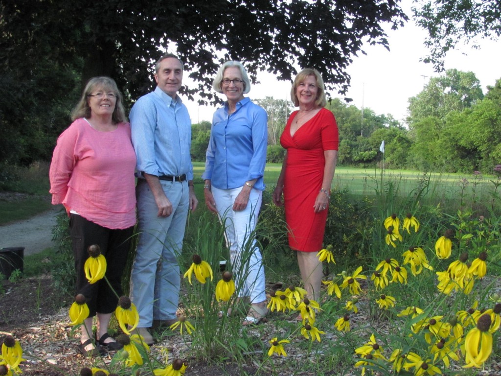 Debbie Weixl and Chris Carey of Canal Shores with Anne Berkeley and Fern Allison of the Garden Club of Evanton